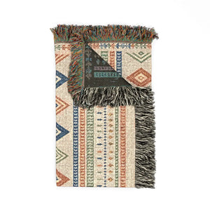 Original DipaliZ artwork on a fringed southwestern woven throw