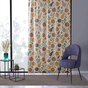Hand-drawn pumpkins and gourds printed on a sheer DipaliZ curtain panel
