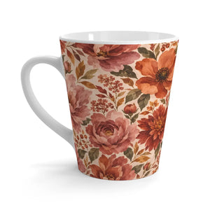Soft-edged vintage blooms in rust and dusty pink on a DipaliZ mug