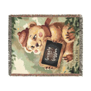 Bear woven blanket draped over a sofa