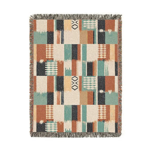Rust and teal southwestern patchwork throw by DipaliZ