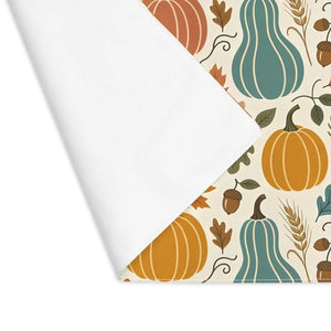 Hemmed edge and harvest print detail on a DipaliZ fall table mat