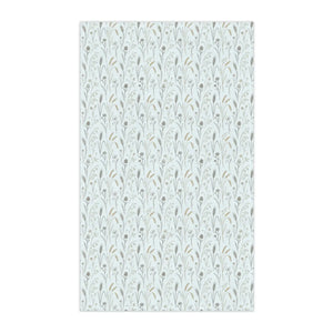 Pale pink and lilac meadow flowers printed on a DipaliZ kitchen towel