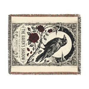 Gothic raven and roses artwork on a DipaliZ woven throw blanket