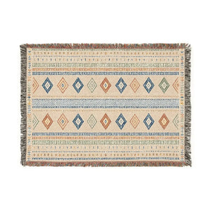 Fringed southwestern throw by DipaliZ with bands and diamonds across the weave