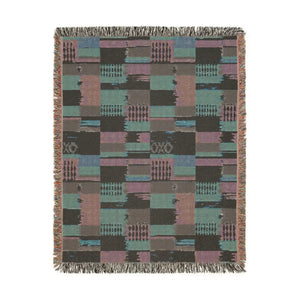 Southwestern patchwork blanket by DipaliZ sized 60 by 50 inches for a couch