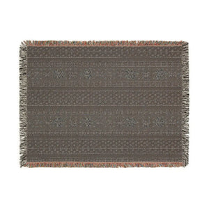 Colorful geometric woven blanket by DipaliZ, dried flat to keep the fringe straight