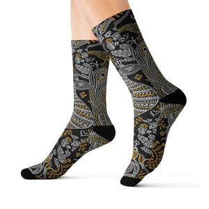 Knee-high socks with a floral pattern on a white background