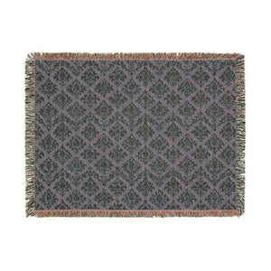 Heavier-handed woven blanket from DipaliZ that holds a neat fold