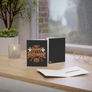 Happy halloween greeting card with ghosts and pumpkins - cards