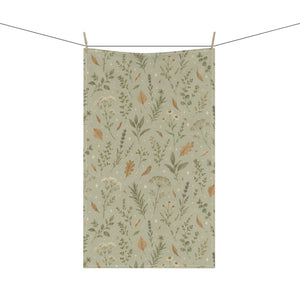 Green wildflowers between herb stems on DipaliZ cottagecore kitchen linen