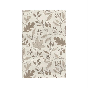 Pale cream ground with outlined oak leaves on a DipaliZ kitchen towel