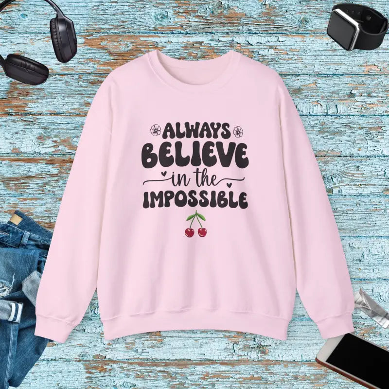 Unisex Heavy Blend Crewneck Sweatshirt Believe in the Impossible - Light Pink / s