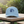 Aquarius hat on an outdoor café table