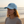 Aquarius hat worn by the seaside