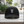 Black cat hat on an outdoor café table