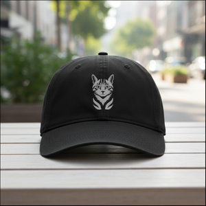Black cat hat on an outdoor café table