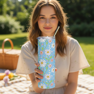 Blue floral tumbler at a garden picnic