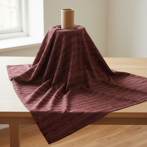 Burgundy linear fabric bolt