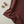 Burgundy linear fabric flatlay