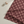 Burgundy medallion fabric flatlay