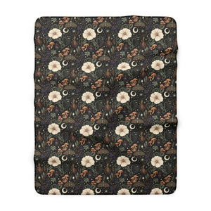 Capped mushroom cluster detail from the DipaliZ celestial floral blanket