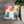 Blocky cat shapes reading clearly at cushion scale, DipaliZ artwork