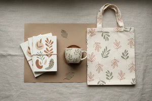 create an image with dipaliz prints without word DipaliZ - At DipaliZ, we believe beauty lives in simplicity. Our designs blend organic minimalism with nature's timeless forms—clean lines that breathe, botanical motifs that ground, earthy palettes that calm. Each piece is created for mindful moments: your morning ritual, your weekend market run, the quiet pause in a busy day. We're not chasing trends; we're cultivating a sustainable soul—where every product reflects our earth-first values and commitment to 