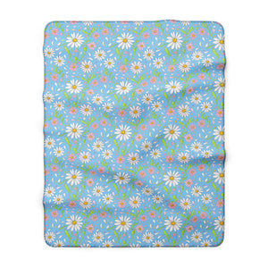 Butter yellow daisy centres and irregular petals on the DipaliZ meadow blanket