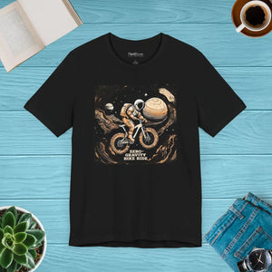 DipaliZ tee showing an astronaut riding a bicycle across the moon
