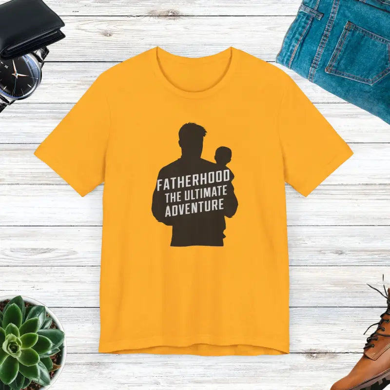 Fatherhood’s Ultimate Adventure Unisex Tee - Gold / s T-shirt