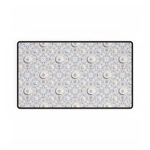 Crescent moon and star detail from the DipaliZ floral moon desk mat