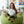 Cats sitting along horizontal rainbow stripes on DipaliZ socks