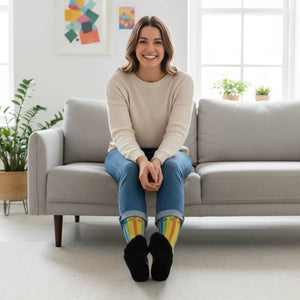 White outlined cat shapes over every stripe on DipaliZ crew socks