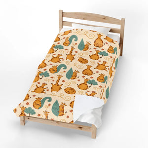 Crisp print detail held by the velveteen pile on the DipaliZ giraffe throw
