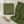 Flat lay of DipaliZ green paisley spun polyester fabric by the yard
