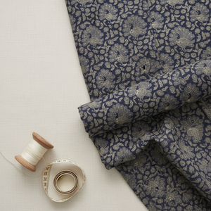 Navy peacock fabric flatlay