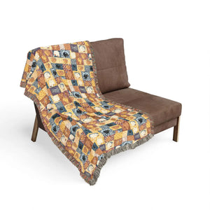Woven quilt-style throw by DipaliZ with the patchwork built into the fabric