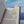 Open book with a bookmark featuring an Aries symbol against a scenic background.
