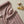 Flat lay of DipaliZ striped rose combed cotton fabric by the yard