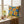 DipaliZ sunny smiles pillow with large smiling cartoon sunflowers