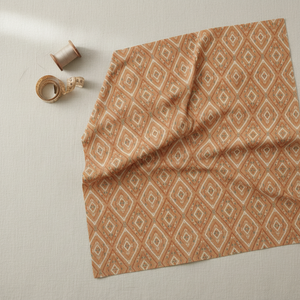Terracotta diamond fabric flatlay