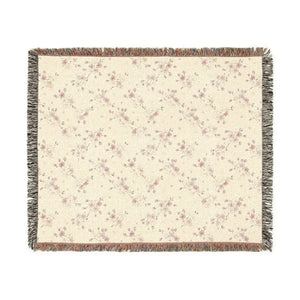Outline flowers in bone and greige on the DipaliZ reversible blanket